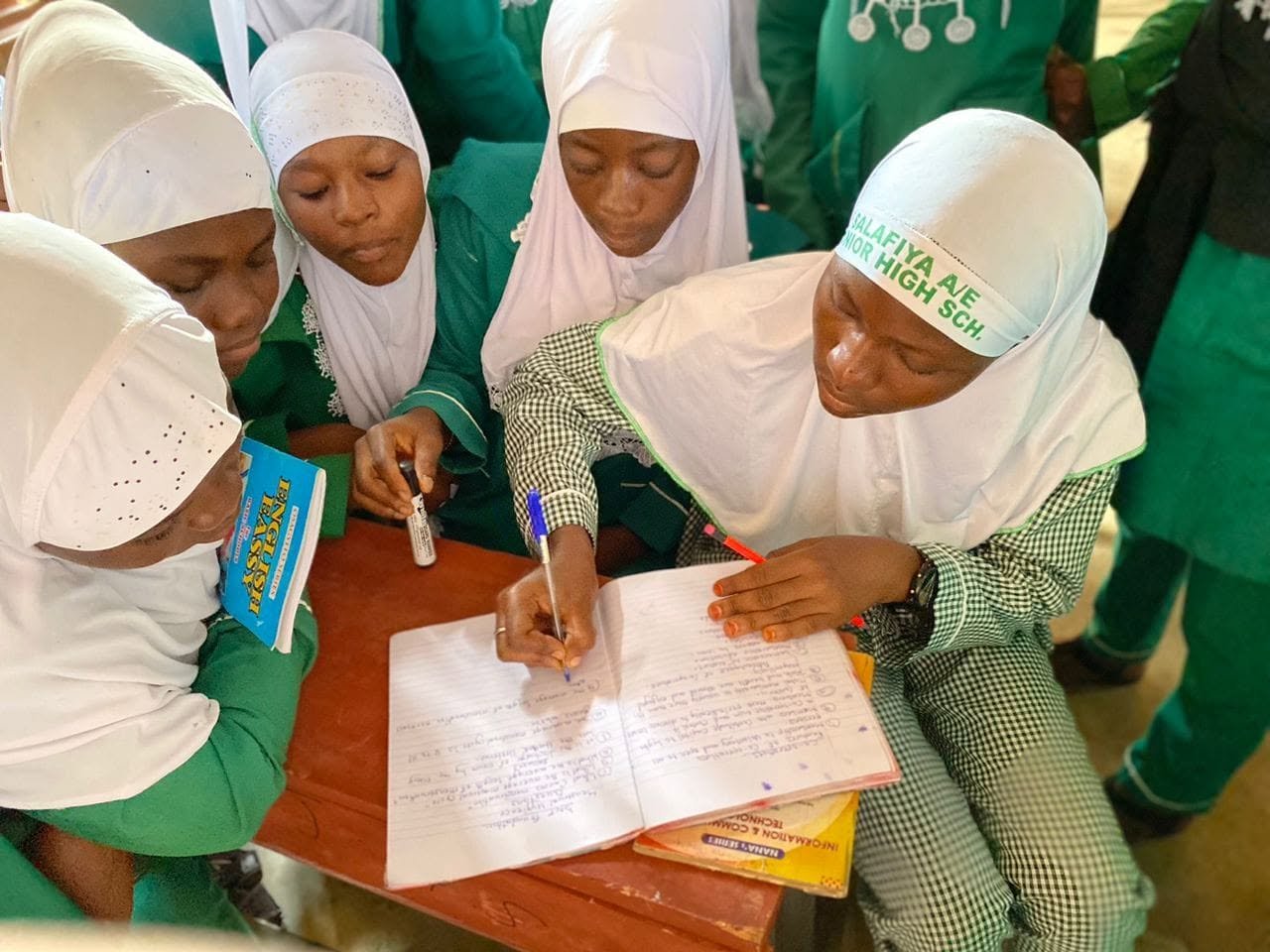 Students completing a learning activity together.